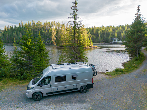Road trip concept, people living the van life experience.\nNorway