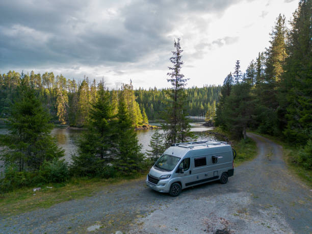istock Van parked by the lake, drone view 1481712164