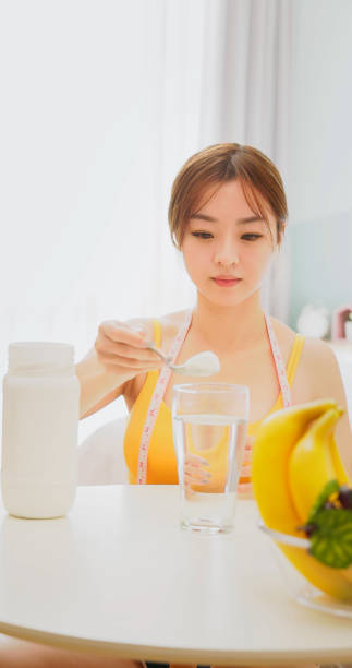 istock woman drink enzyme powder 1481715243