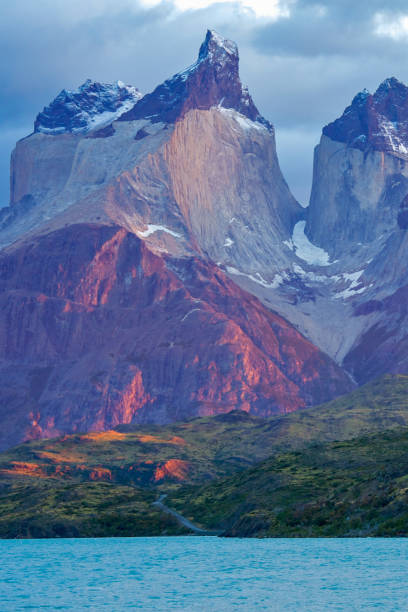 View across Lake Pehoe to the Cuernos del Paine, a granite rock formation in Torres del Paine National Park, Patagonia, Chile..