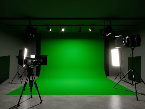istock green screen photo studio with lighting and movie camera. 3D rendering 1481719184