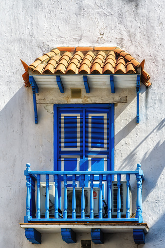 Blue and white typical balcony in the city of  Cartagena de las Indias, Colombia