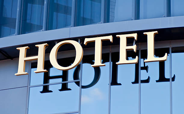 istock Golden hotel sign with reflection on glass 148173404