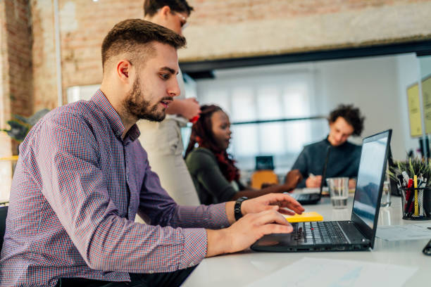 istock Man working on a laptop in the office 1481739019