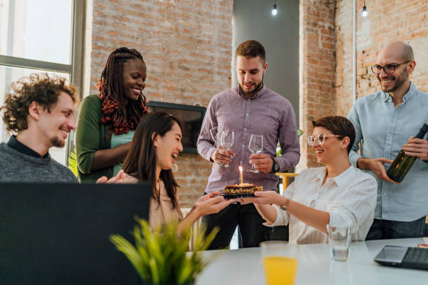 istock Colleagues celebrating a female colleague's birthday 1481739242