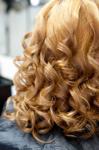 istock Beautiful light, wavy curls, hairstyle closeup 1481740207
