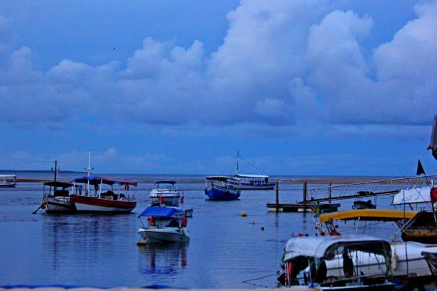 istock Blue sunset over Boipeba beach. Boats parked on the bay 1481740436