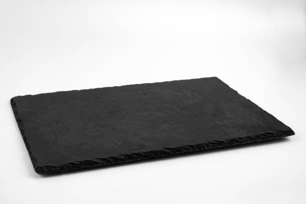 istock Slate plate isolated on white background. Empty stone tray for food. 1481751217