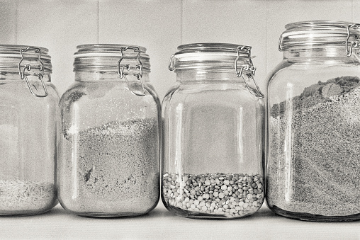 Image of jar full with organic honey, production in factory.