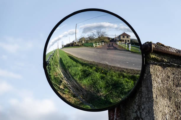 istock Round road mirror against the sky. 1481753005