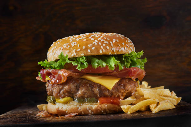 istock Juicy PORK and Bacon Cheeseburger with Fries 1481757349
