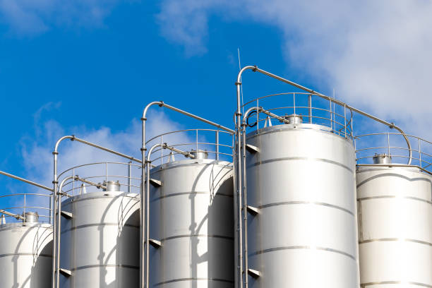 istock Stainless steel silos against the blue sky. 1481759420