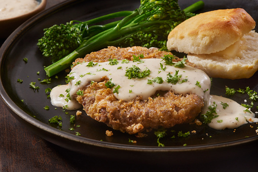 Chicken Fried Steaks with Country Style Gravy, Broccolini and a Biscuit