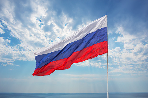 Flag of the Russian Federation on the background of the sky