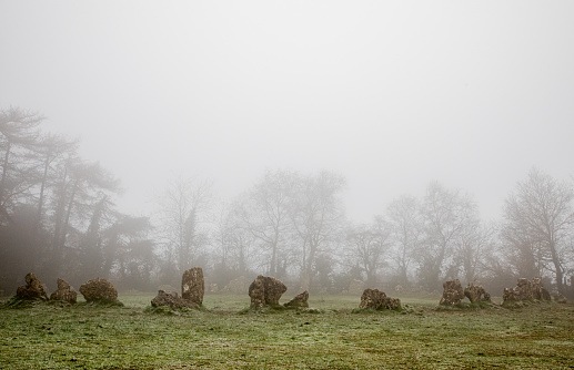 The Rollright Stone Circle in Oxfordshire on a misty winters afternoon.