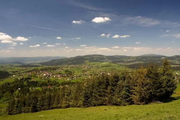 A scenic view of the village Koniakow captured from the top of Ochodzita mountain in Poland