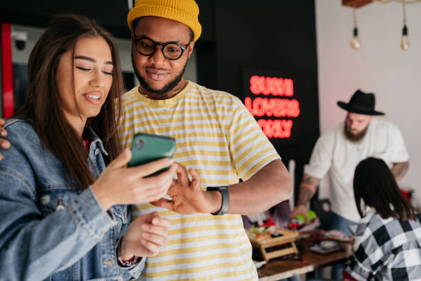 istock Friends talking and eating sushi 1481764915