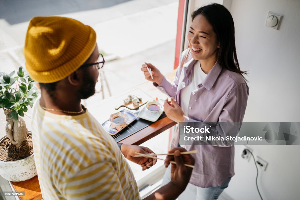 Couple eating sushi Business Lunch Stock Photo