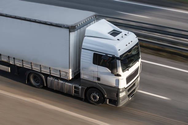 istock Truck moves on highway 1481764971