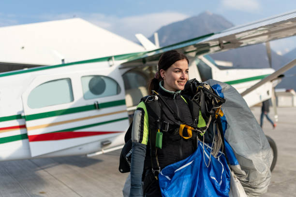 istock Skydiving woman touches the ground. 1481768247