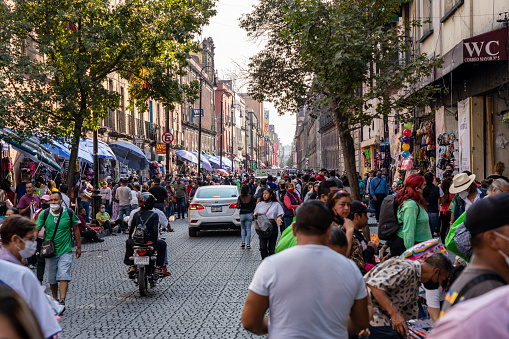 Mexico City Mexico - February 18 2022: A Busy Street in Mexico City in the Downtown Centro District with Many Shops and Markets