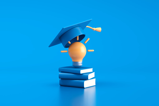 Light bulb, graduation cap and stack of book. 3d illustration