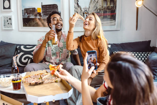 Young cheerful people on a house party