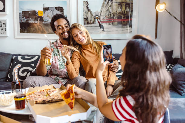 istock Young cheerful people on a house party 1481770902