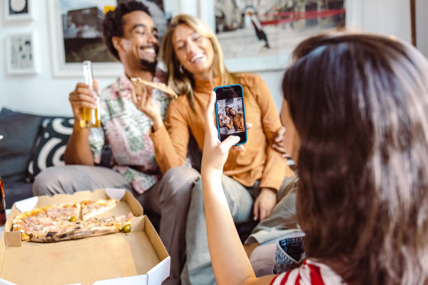 istock Young cheerful people on a house party 1481770944