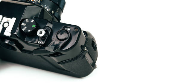 istock Vintage black film camera with dial shutter speed selector and shutter button included film slider on camera body 1481784633