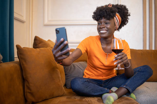 istock Happy young woman using phone 1481787799
