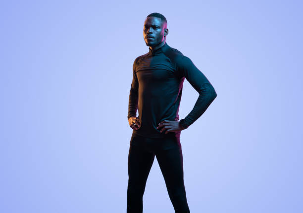 istock Confident black sportsman standing on blue background 1481789380