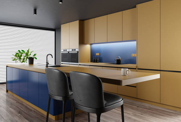 istock Golden yellow and blue Modern minimalist kitchen with long island with stools. Matte materials. 1481789953