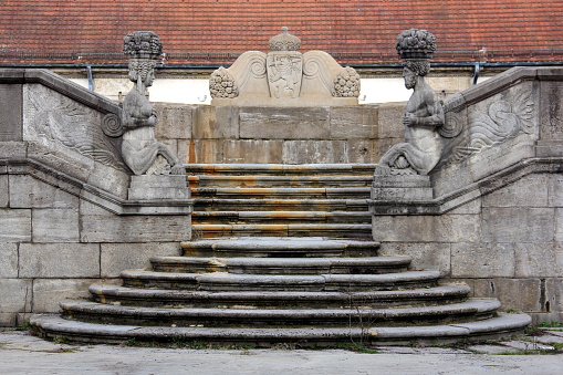 Details of Jugendstil sculptural and stone-carved decorations of the fountain, at the Sprudelhof, mineral waters spa and hydrotherapy complex, Bad Nauheim, Hesse, Germany