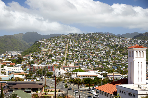 Kaimuki, Honolulu, Oahu, Hawaii, USA, - February 10, 2023: View Overlooking Kaimuki with long, steep road called Wilhelmina Rise climbing up the mountain