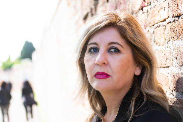 istock Pensive thoughtful middle aged woman looking away. 1481792639