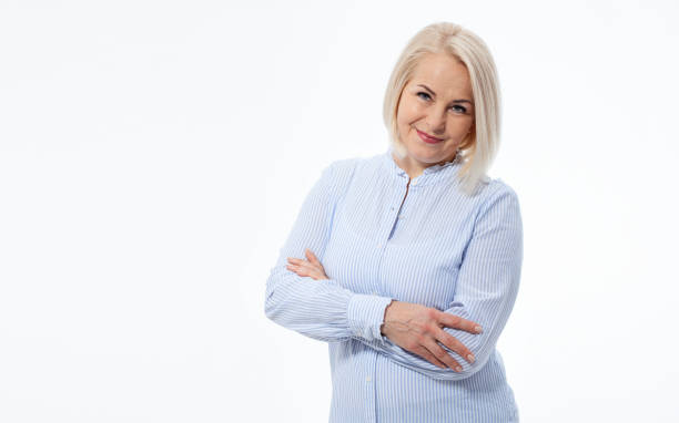 istock Attractive middle aged woman with folded arms on white background 1481802439