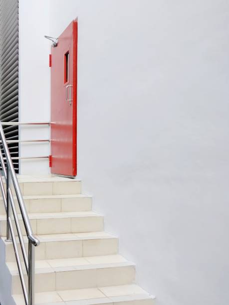 istock red emergency door and stairs 1481802558