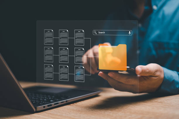 istock Document management and network system concept, Businessman use smartphone  search for documents in online archives ,Document management Storage and technology on digital document paperless operation 1481812789