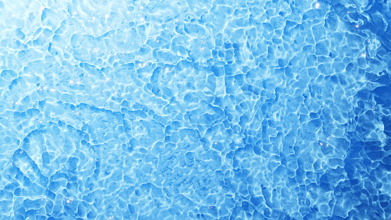 3D Illustration.Textured image of glowing water surface. Caustics