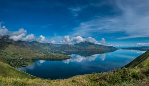 Lake Toba, Indonesia View of lake toba in panoramic form. Natural beauty of hills and lakes. danau toba lake stock pictures, royalty-free photos & images