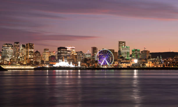 istock Montreal skyline at night reflected in St. Lawrence River, Canada 1481821416