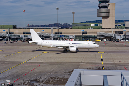 Bulgaria Air airplane Airbus A320-214 register LZ-FBD with no livery taxiing at Swiss airport Zürich Kloten on a late winter day. Photo taken March 17th, 2023, Zurich, Switzerland.