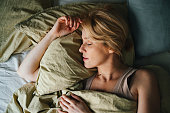 Top View of Woman Sleeping in Bed
