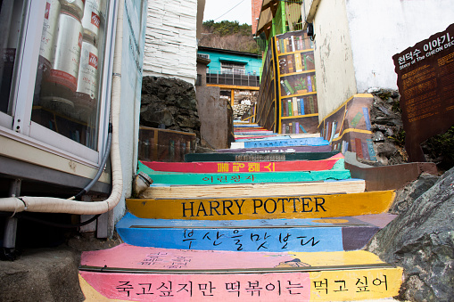 Colorful stairs step art in small alley for korean people and foreign travelers walking travel visit in Gamcheon Culture Village or Santorini of Pusan city on February 18, 2023 at Busan, South Korea