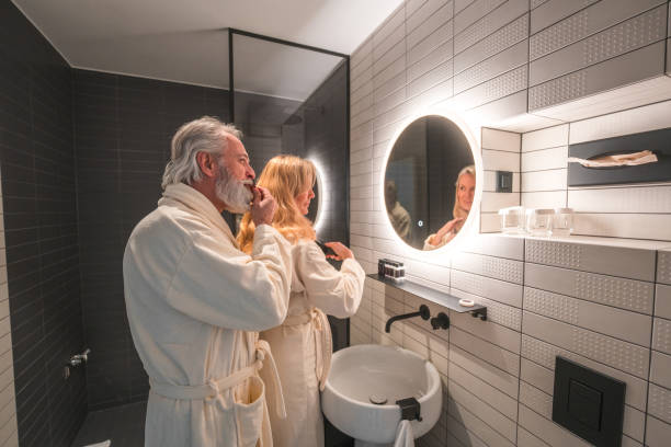 istock Mature Caucasian Couple Getting Ready In The Bathroom 1481834486