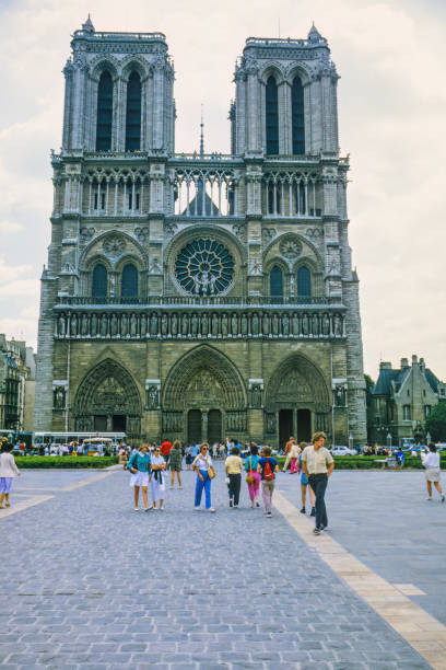 Paris, France: The Seine River leads to the Notre Dame Cathedral with a construction crane. Repairs have been ongoing since 2019 when a devastating fire broke out in its roof.