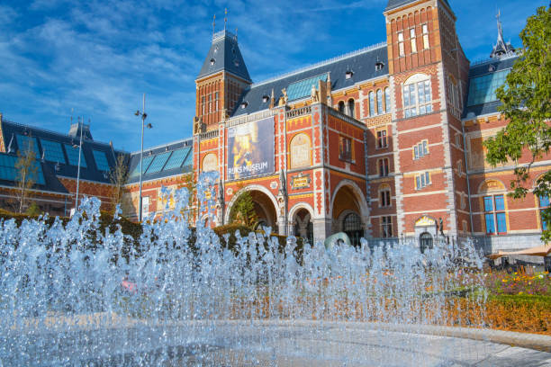 Amsterdam Architecture otuside the Rijksmuseum facades with a blue sky in the background during summer.