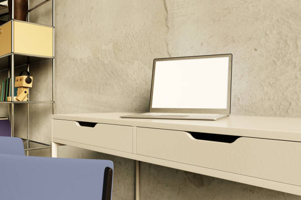 istock Cropped shot of minimal workspace with mock-up laptop, smartphone on white table. 3d render 1481841919