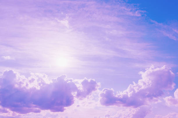 Sunrise,Purple and Pink Sky and clouds with abstract colored background.Toned.